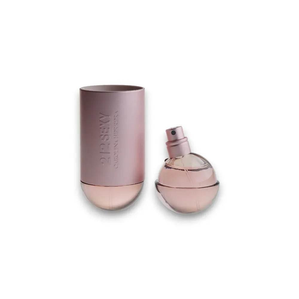 Rosa Eau de Parfum Flakon mit rundem Zerstäuber und passender Verpackung, Luxusduft
