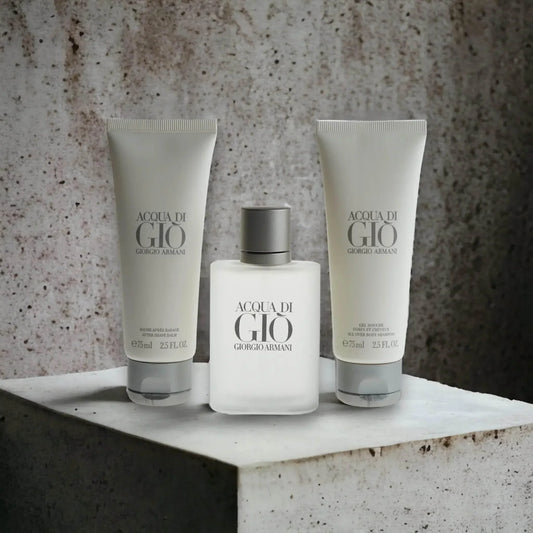 Acqua di Giò Duftset mit Parfum, Aftershave und Duschgel vor Betonhintergrund