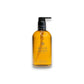 Molton Brown Amber Cocoon Handseife in transparentem Pumpspender, goldene Flüssigkeit