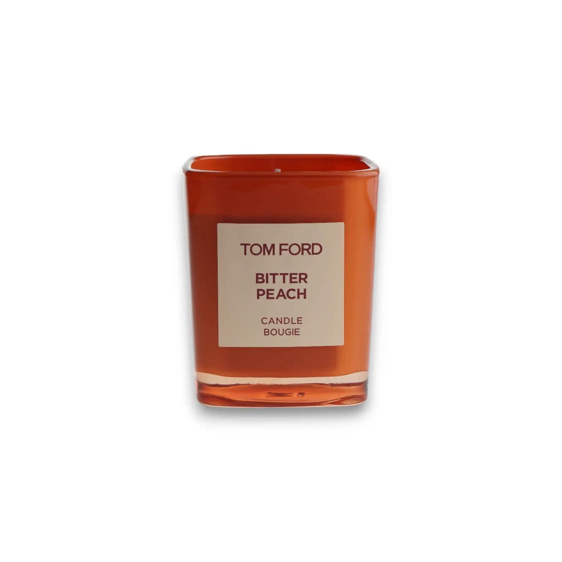 Orange Duftkerze mit Beschriftung Bitter Peach, luxuriöse Duftkerze, elegantes Design
