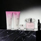 Versace Bright Crystal Duftset mit Eau de Toilette, Duschgel, Bodylotion und Miniatur auf schwarzem Marmor