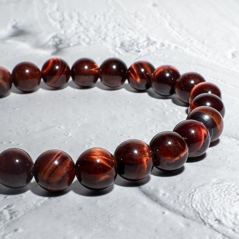 ARMBAND ROTES TIGERAUGE PERLEN 8MM