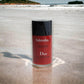 Fahrenheit Deo Stick Deodorant von Dior am Strand, roter Stick mit schwarzem Deckel, 75g