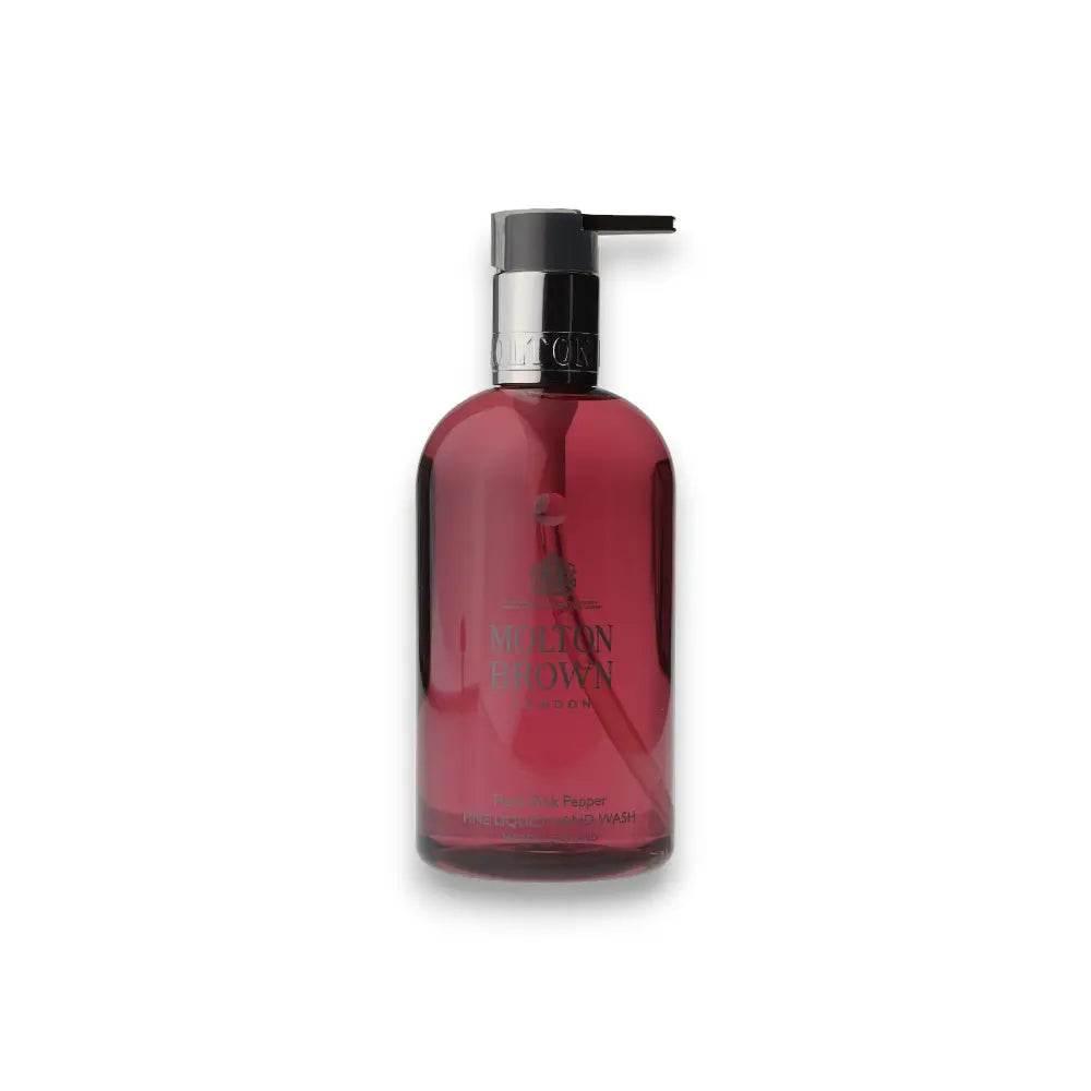 Transparente Seifenspenderflasche mit rosafarbenem Handwaschgel und silbernem Pumpspender
