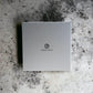 Giorgio Armani Parfumset Geschenkbox auf grauem Steinuntergrund, edles Design