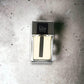 Dior Homme Intense Eau de Parfum Flakon auf marmoriertem Hintergrund, Herrenduft, Luxusparfum