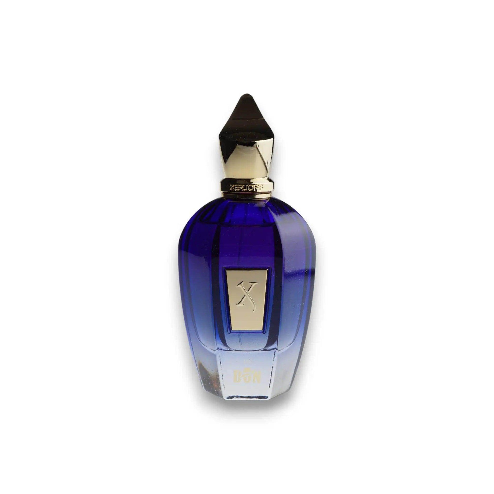 Blauer Parfumflakon mit goldfarbenem Verschluss und Etikett, luxuriöses Design