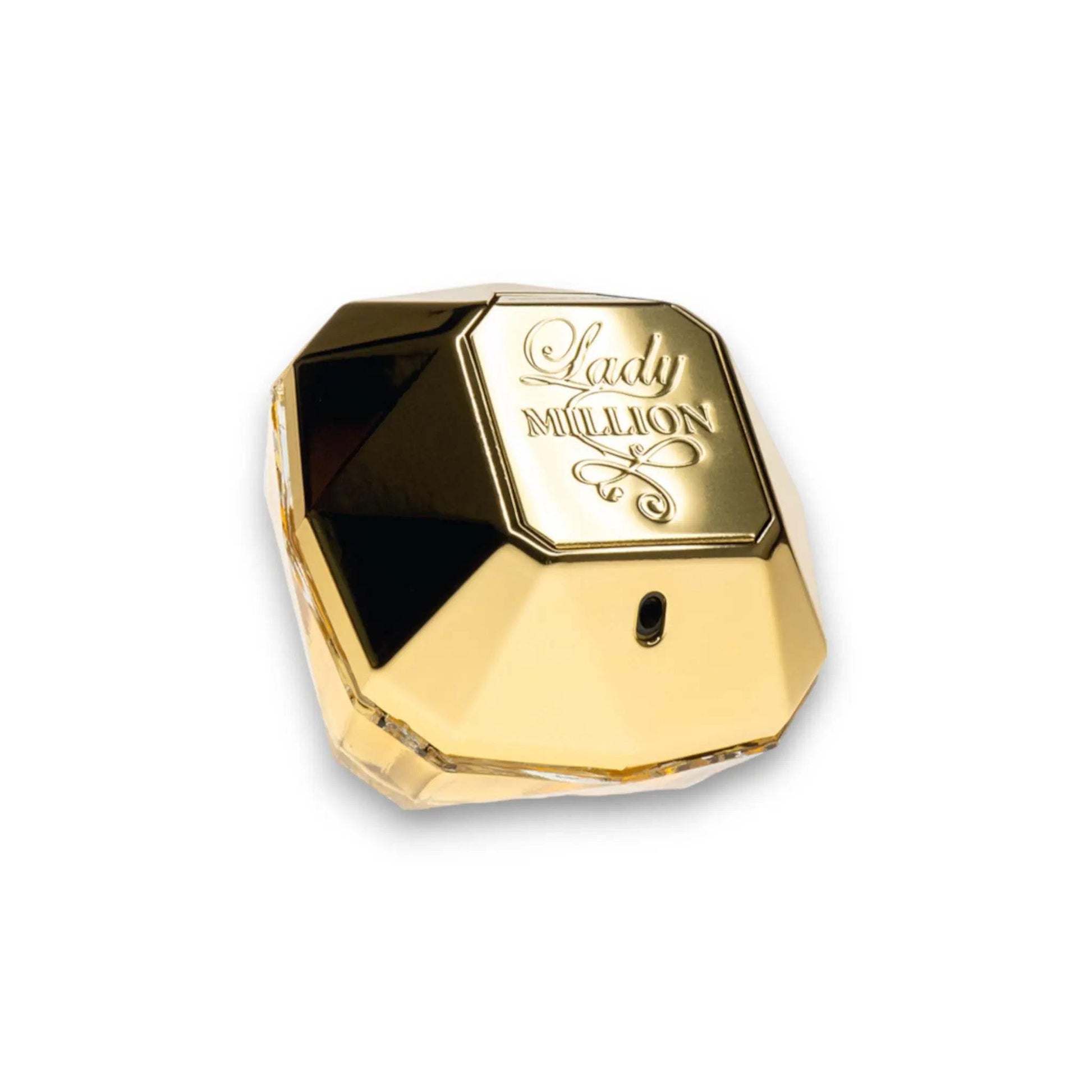 Lady Million Parfum in goldener, diamantförmiger Flasche auf weißem Hintergrund