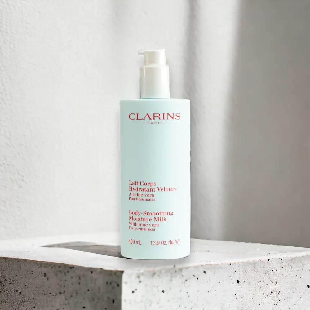 Clarins Body-Smoothing Moisture Milk mit Aloe Vera, 400ml, auf heller Oberfläche, Produktfoto