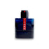 Dunkelblaue Parfumflasche mit rotem Etikett und Aufschrift Luna Rossa Ocean