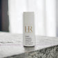 Weißer Roll-On-Deodorant Helena Rubinstein Nudit, 50 ml, auf Steinoberfläche, Nahaufnahme