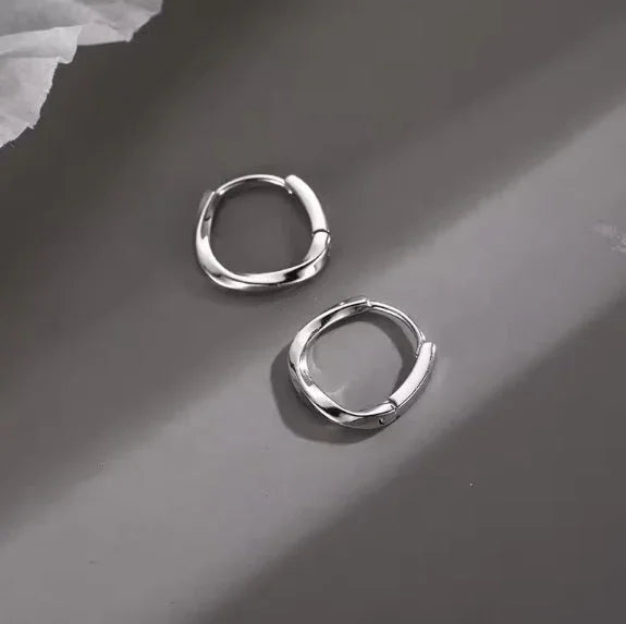 Ohrringe aus 925er Sterling-Silber, wellige Creolen