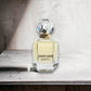 Roberto Cavalli Paradiso Eau de Parfum im eleganten Flakon auf hellem Steinuntergrund