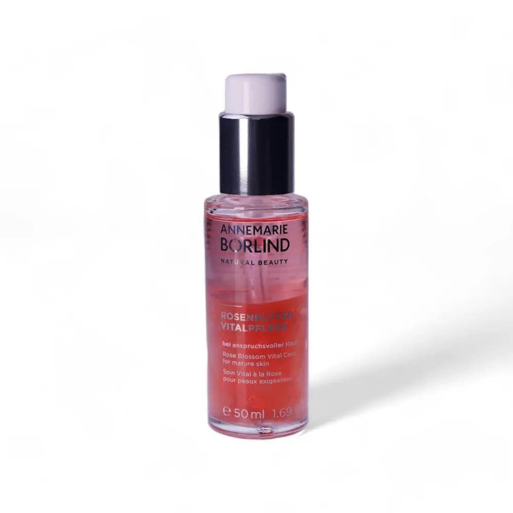 Rosenblüten Vitalpflege Serum in transparenter Flasche mit silbernem Spender, 50 ml