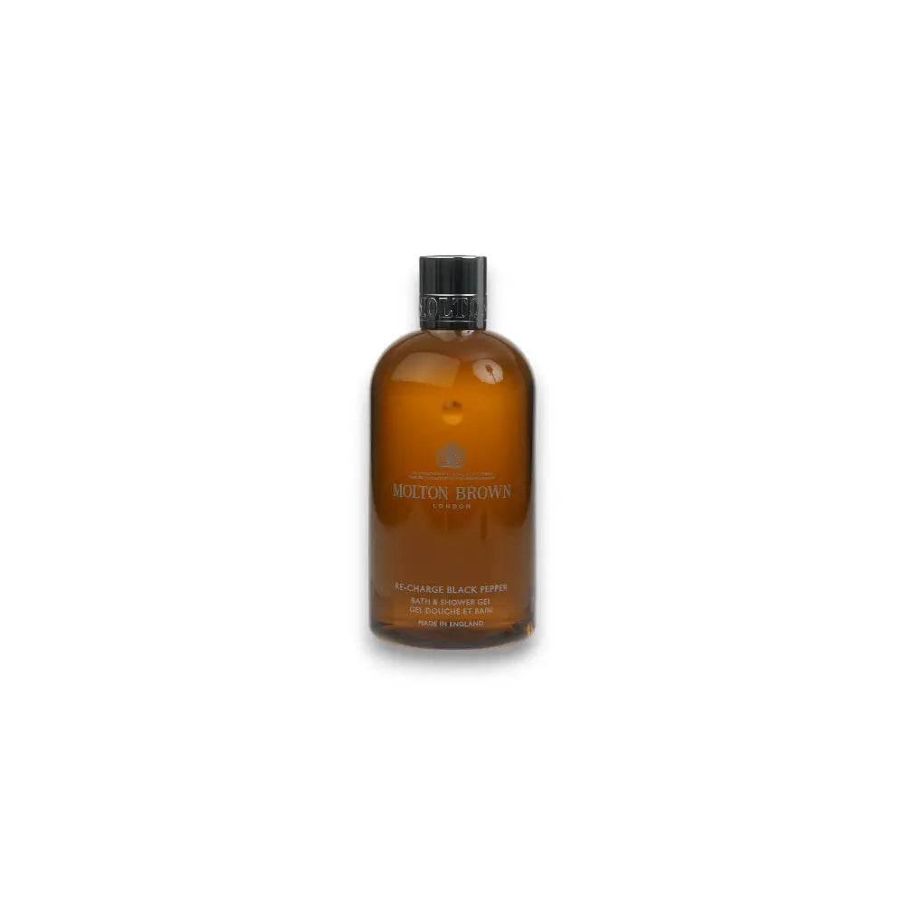 Braune Flasche Molton Brown Re-Charge Black Pepper Duschgel, Luxus-Kosmetik freigestellt
