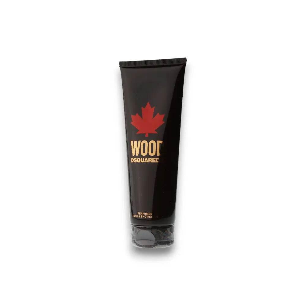 Schwarzes DSQUARED2 Wood Duschgel mit rotem Ahornblatt auf der Tube, freigestellt.