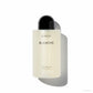 Byredo Blanche Body Wash 225 ml, Flasche mit cremefarbenem Duschgel und schwarzer Kappe