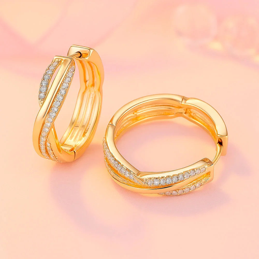 Ohrringe aus Edelstahl, vergoldet, gedrehte Zirkonia Creolen