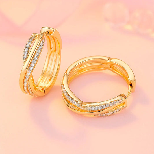 Ohrringe aus Edelstahl, vergoldet, gedrehte Zirkonia Creolen