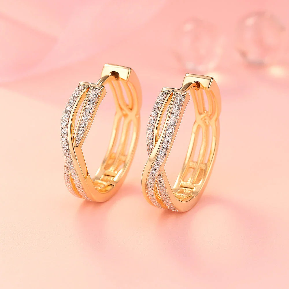 Ohrringe aus Edelstahl, vergoldet, gedrehte Zirkonia Creolen