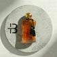 mach_dieser_Flasche_liegt_auf__Nano_Banana_Pro_15889 - BLACK ELIXIR - Maison de Parfum