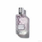 Reyane Tradition Acqua di Parisis Bloom Velours Eau de Parfum 100ml – Kristallglas-Flasche liegend freigestellt auf weißem Hintergrund