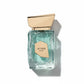 Aether Extrait Parfum in einem türkisfarbenen Glasflakon mit goldenem Verschluss