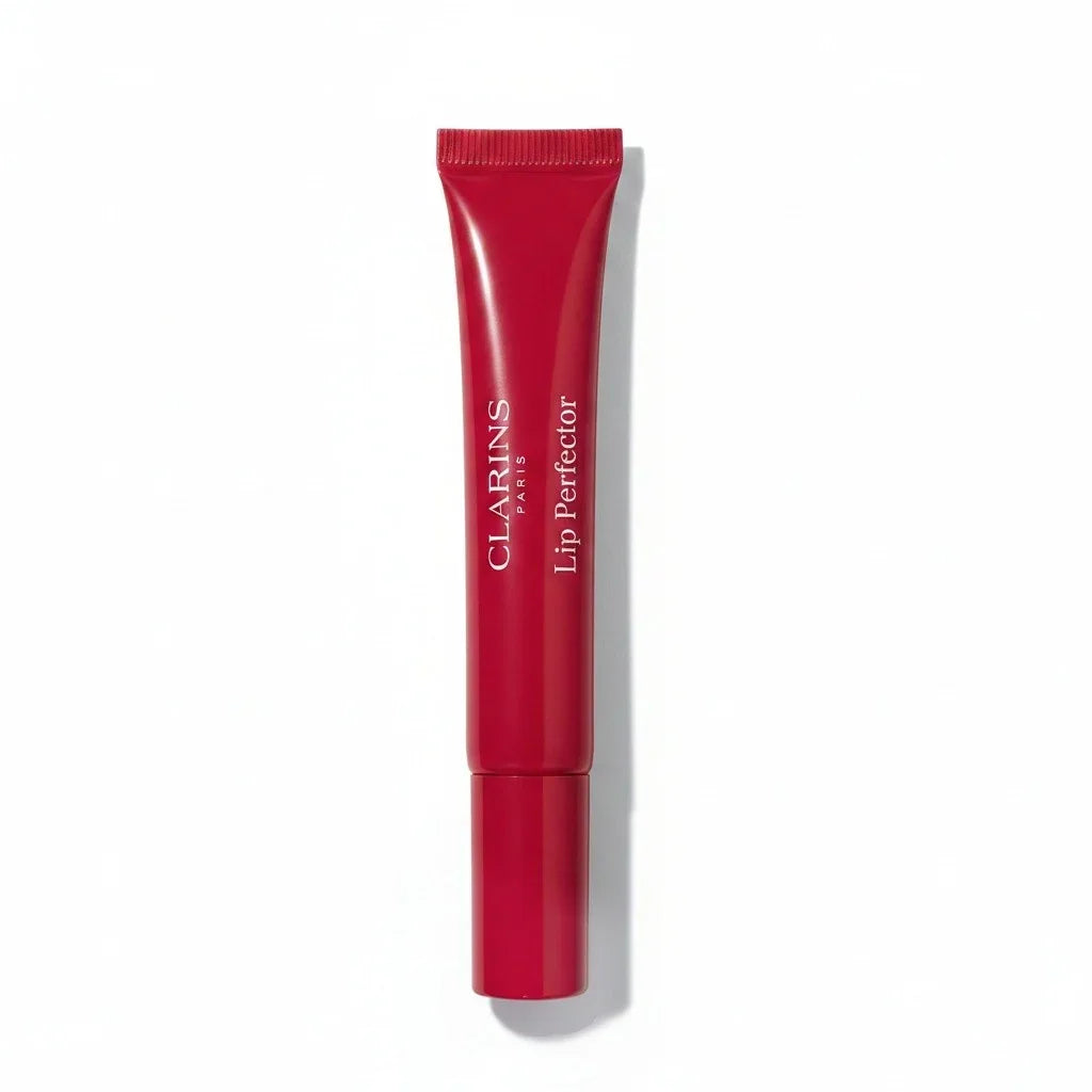 Clarins Lip Perfector Lippenpflege in einer roten Tube auf weißem Hintergrund