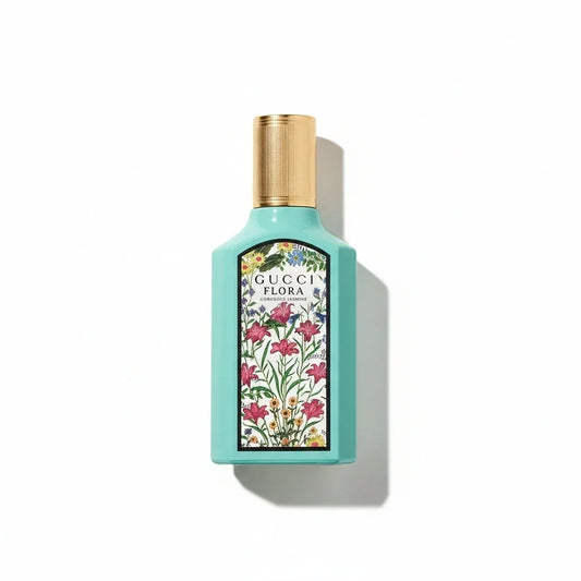 Gucci Flora Gorgeous Jasmine Parfum in einer türkisfarbenen Flasche mit floralem Design