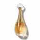 Eleganter goldener Parfumflakon mit weißem Kugelkopf vor weißem Hintergrund