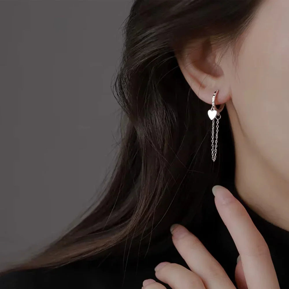 Ohrringe aus 925er Sterling-Silber, fesselndes Herz mit Zirkonia